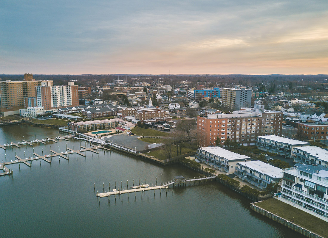 Red Bank, NJ - Aerial View of Red Bank, New Jersey Buildings and Bay at Dusk